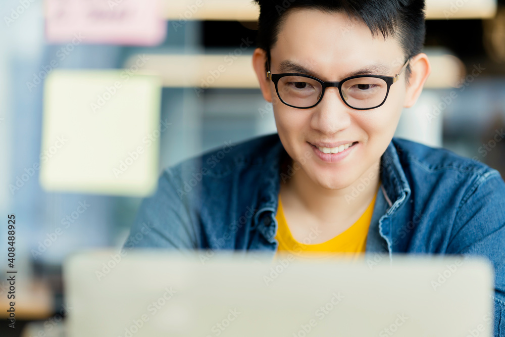 Smart attractive positive asian business male wearing glasses work remote new normal lifestyle hand 