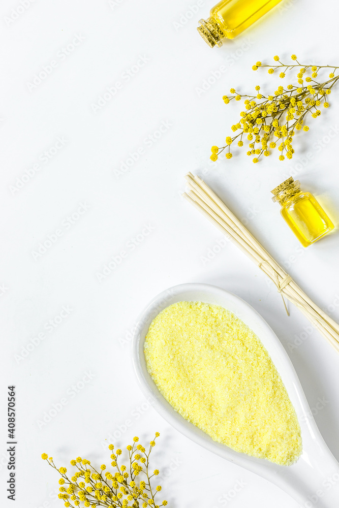 Yellow cosmetic set for body care on white background top view