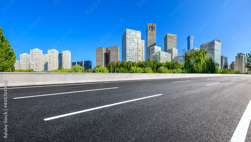 Asphalt road and modern city commercial buildings in Beijing,China.