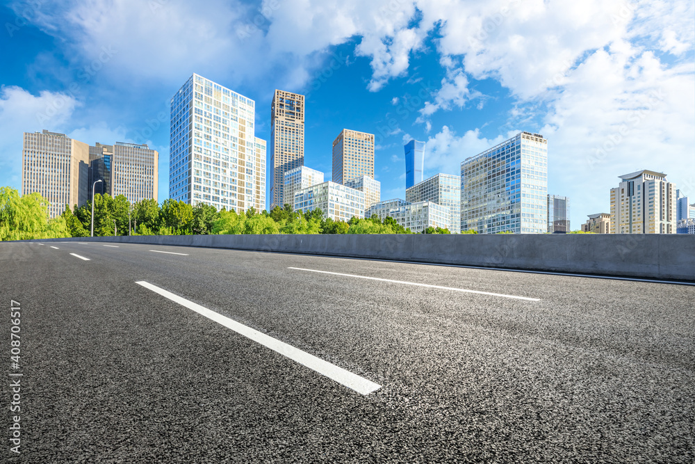 Asphalt road and modern city commercial buildings in Beijing,China.