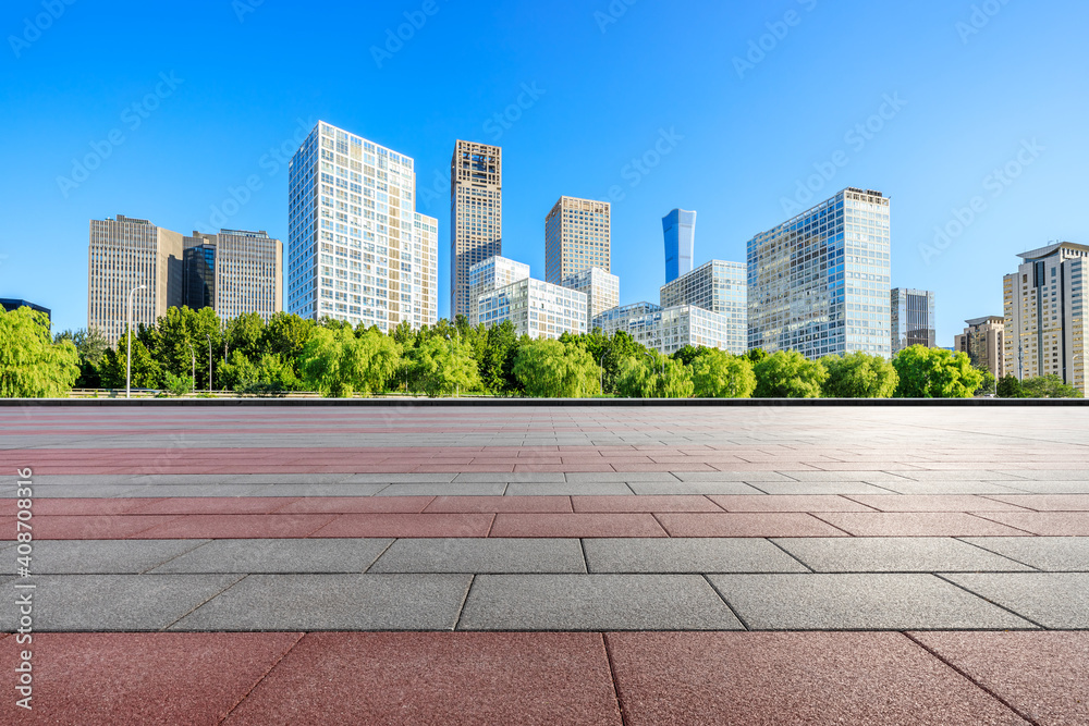 Empty square floor and modern city commercial buildings in Beijing,China.