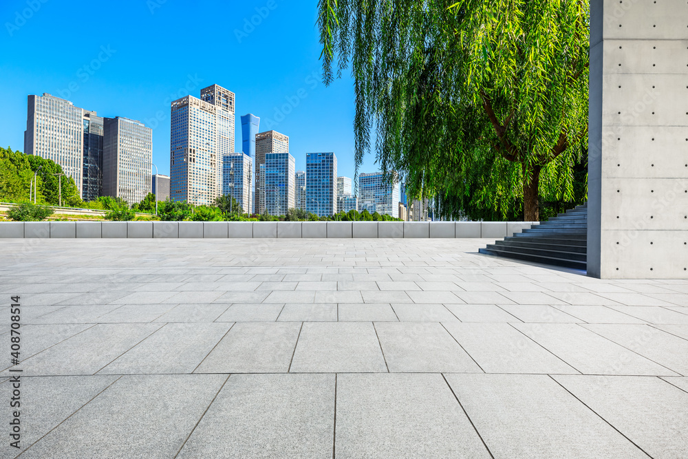 Empty square floor and modern city commercial buildings in Beijing,China.