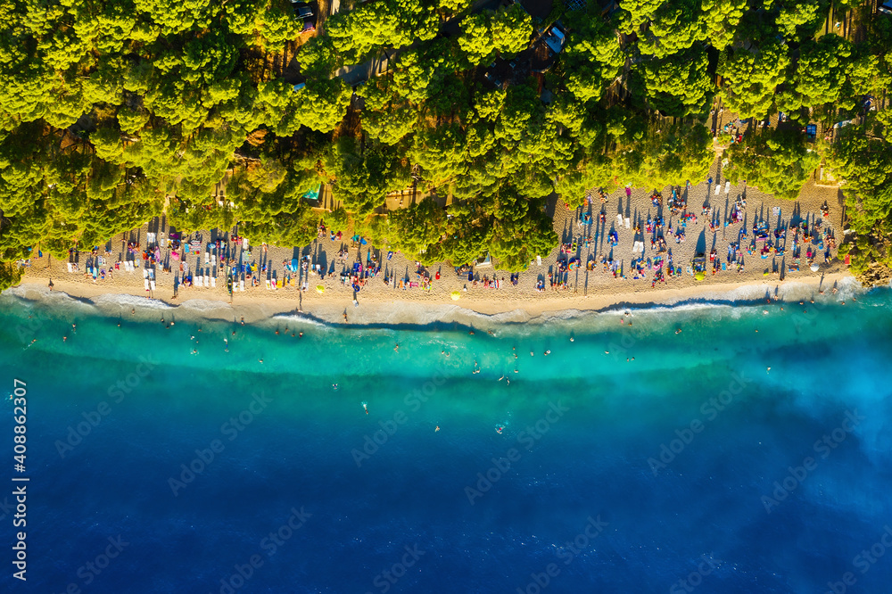 Mediterranean sea. Aerial view on beach and people. Vacation and relax. Beach and blue water. Top vi