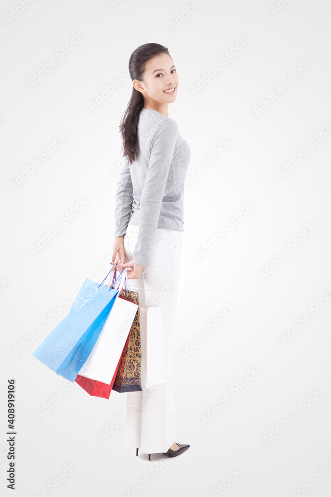 Oriental fashion young female shopping