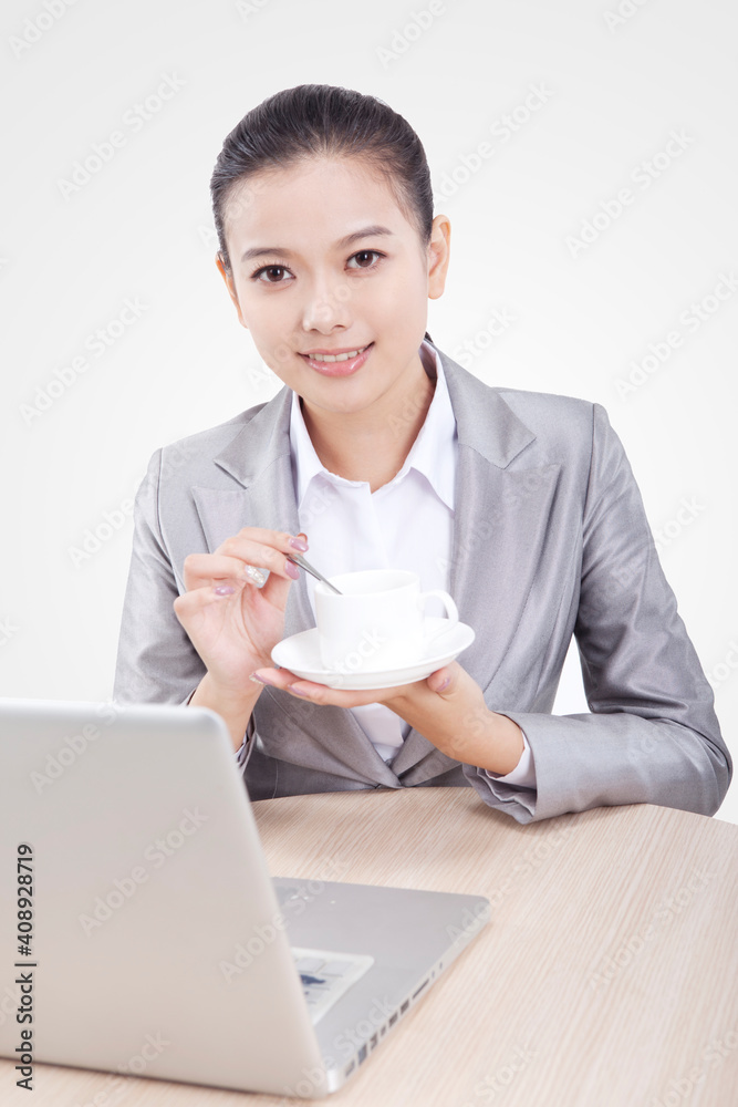 Business woman drinking coffee