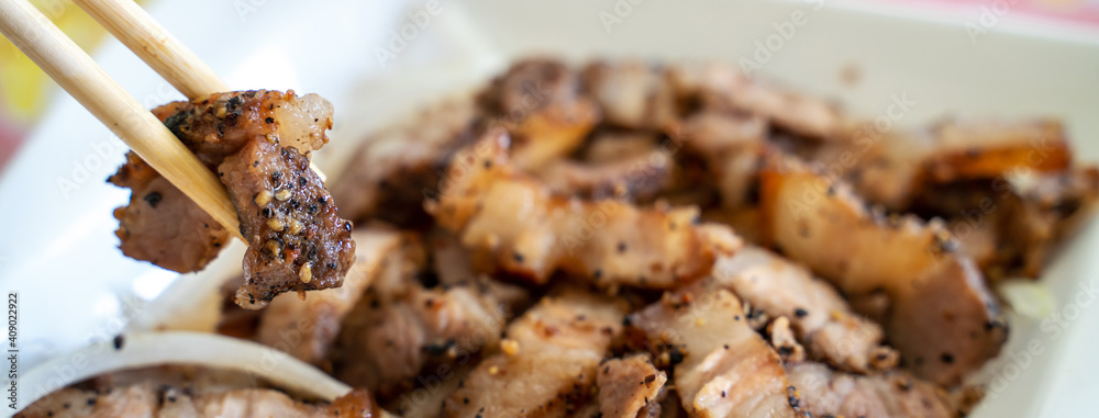 Delicious Taiwanese salted pork food with onion in restaurant.