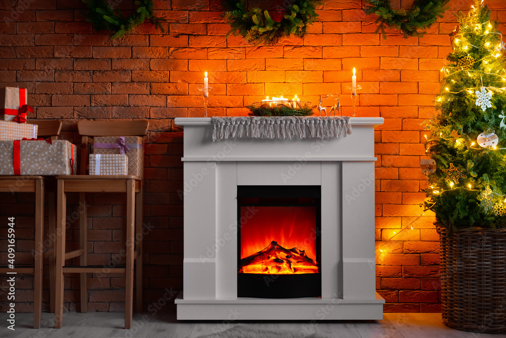 Interior of modern living room with fireplace and Christmas tree