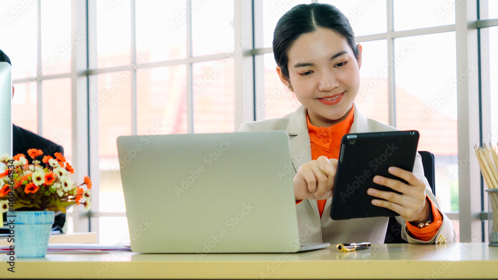 Business people working at table in modern office room while analyzing financial data report .