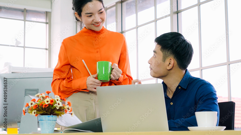 Two business people talk project strategy at office meeting room. Businessman discuss project planni