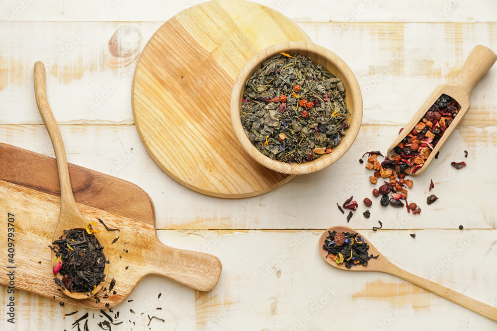 Composition with dry fruit tea on wooden background