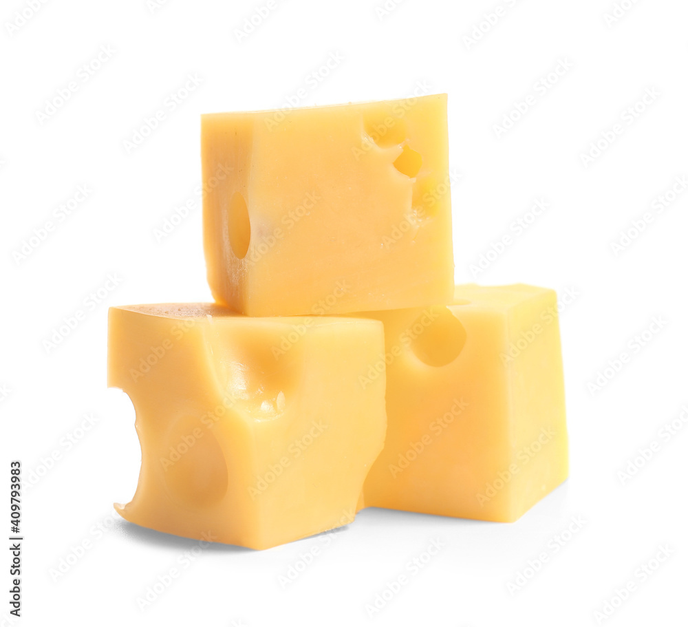 Pieces of tasty cheese on white background