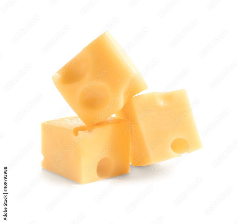 Pieces of tasty cheese on white background