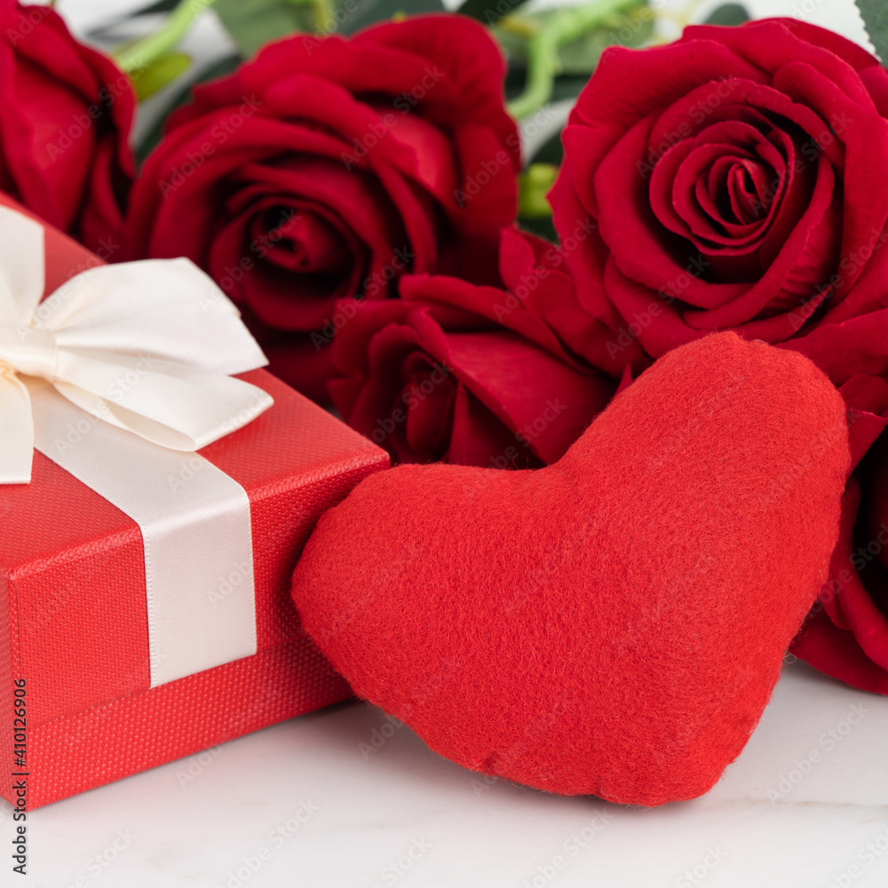 Valentines Day design concept background with rose flower and gift box.