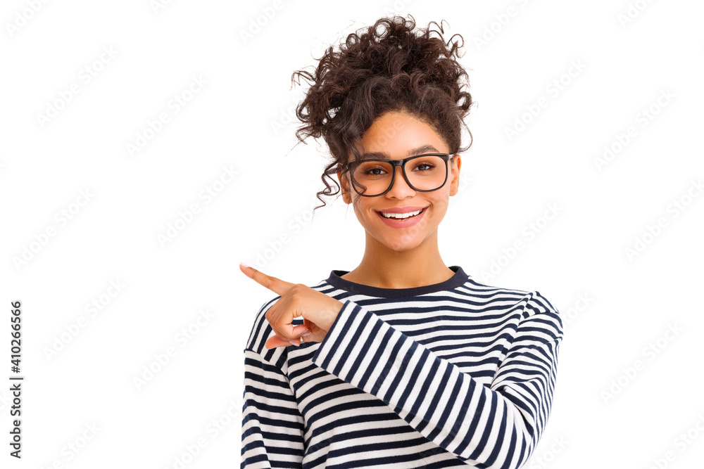 Cheerful stylish woman pointing away