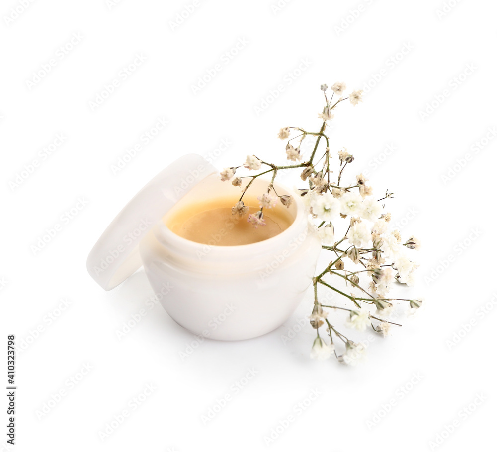 Natural lip balm on white background