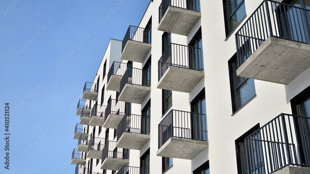 Modern apartment building in sunny day. Exterior, residential house facade.