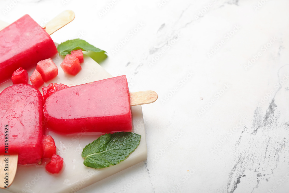 Composition with watermelon ice cream on light background