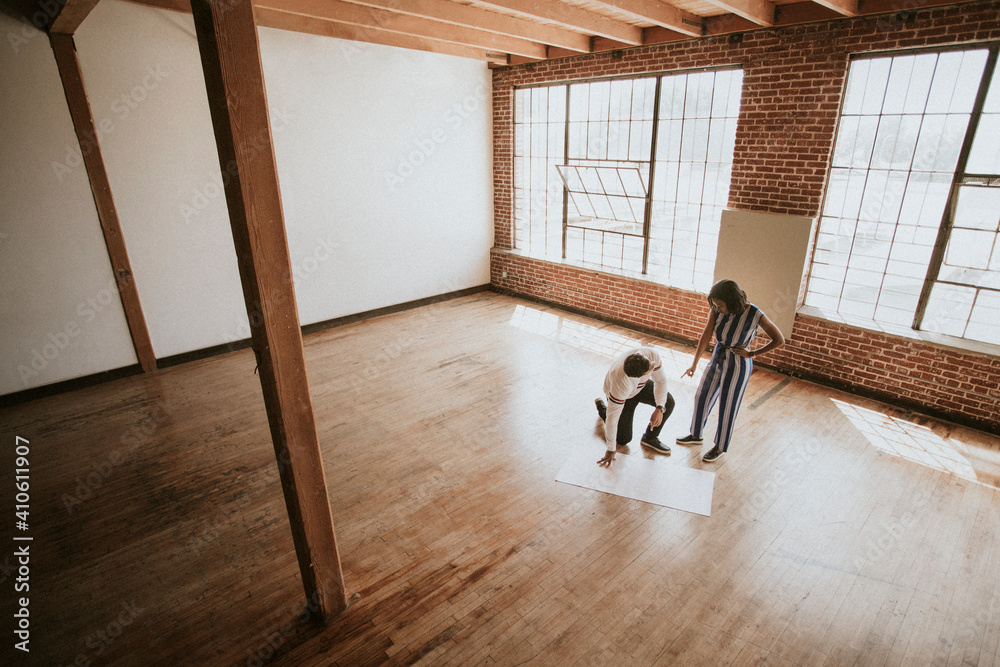 People brainstorming on the floor