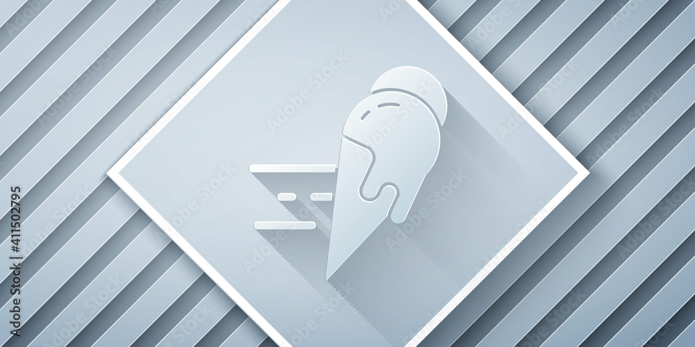 Paper cut Online ordering and ice cream in waffle cone icon isolated on grey background. Sweet symbo