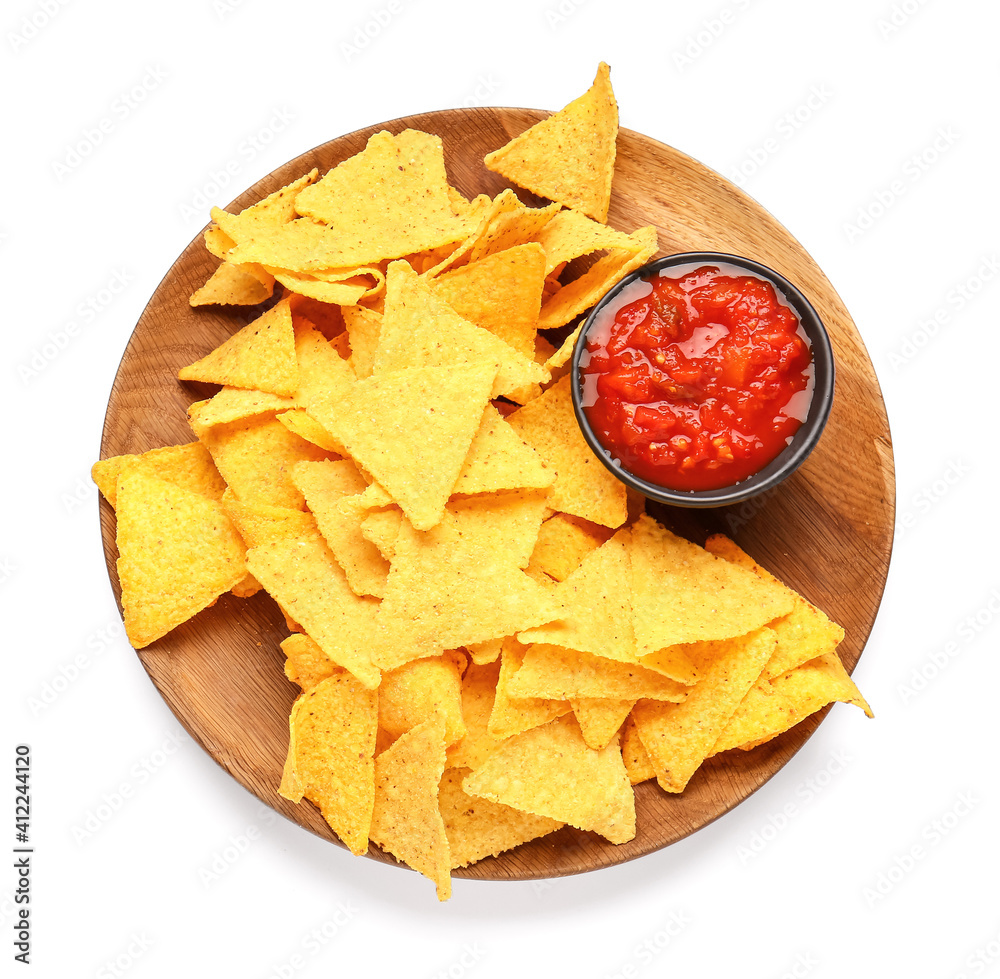 Plate with tasty nachos and sauce on white background