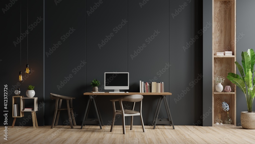 Modern interior working room with chair,plants,book,table on black wall background.