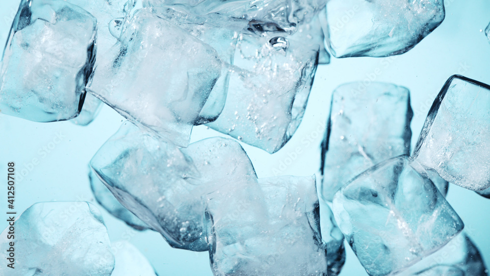 Detail of whirling water with ice cubes