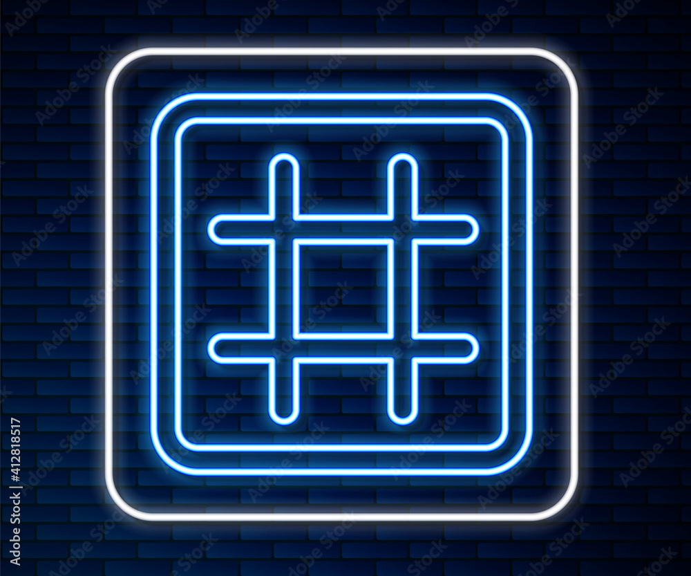 Glowing neon line Waffle icon isolated on brick wall background. Vector.