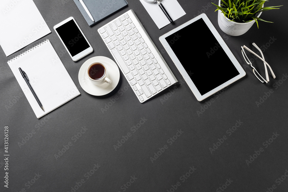 Top view of workplace with digital devices