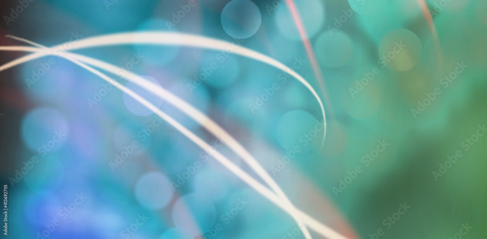 Abstract illustration of white wavy lines over green spots of bokeh lights against grey background