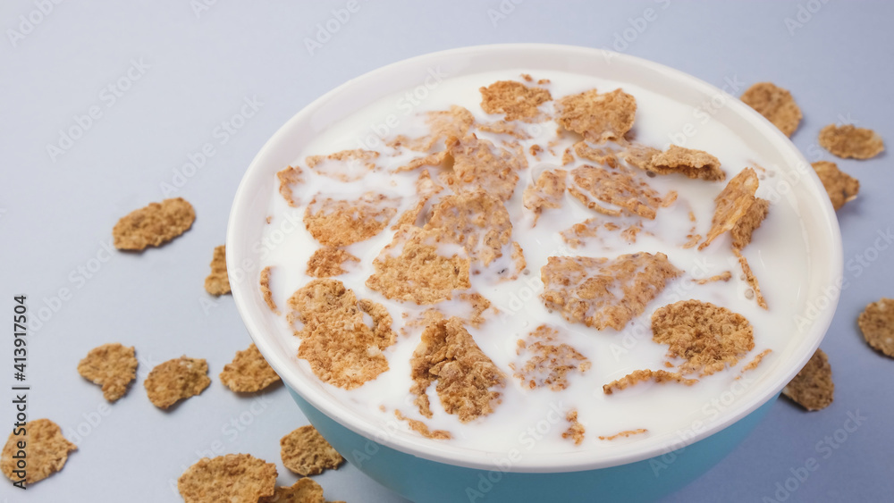 Bowl of bran flakes with milk, cereal breakfast