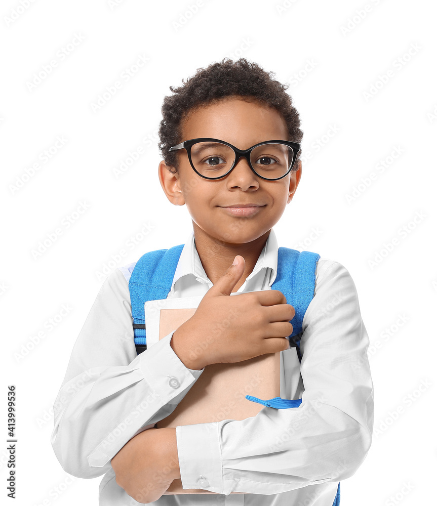 Little African-American schoolboy on white background