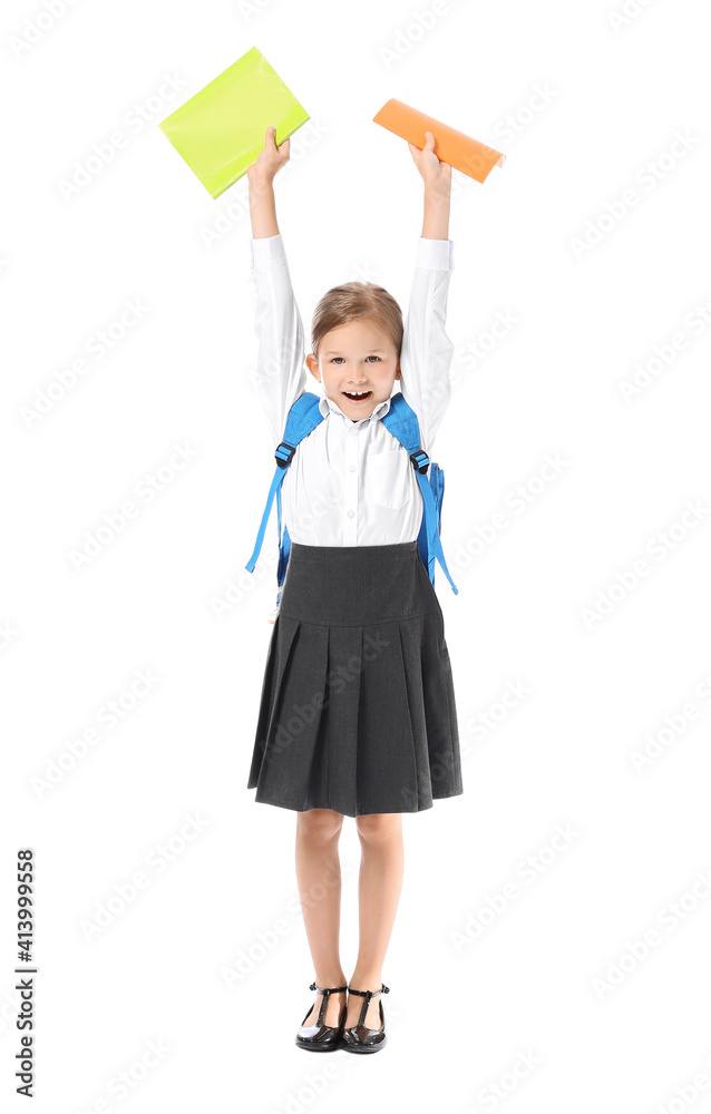 Happy little schoolgirl on white background