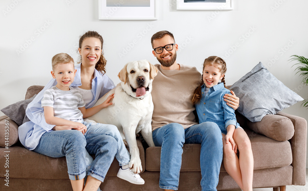 Positive family with kids and dog spending time together at home