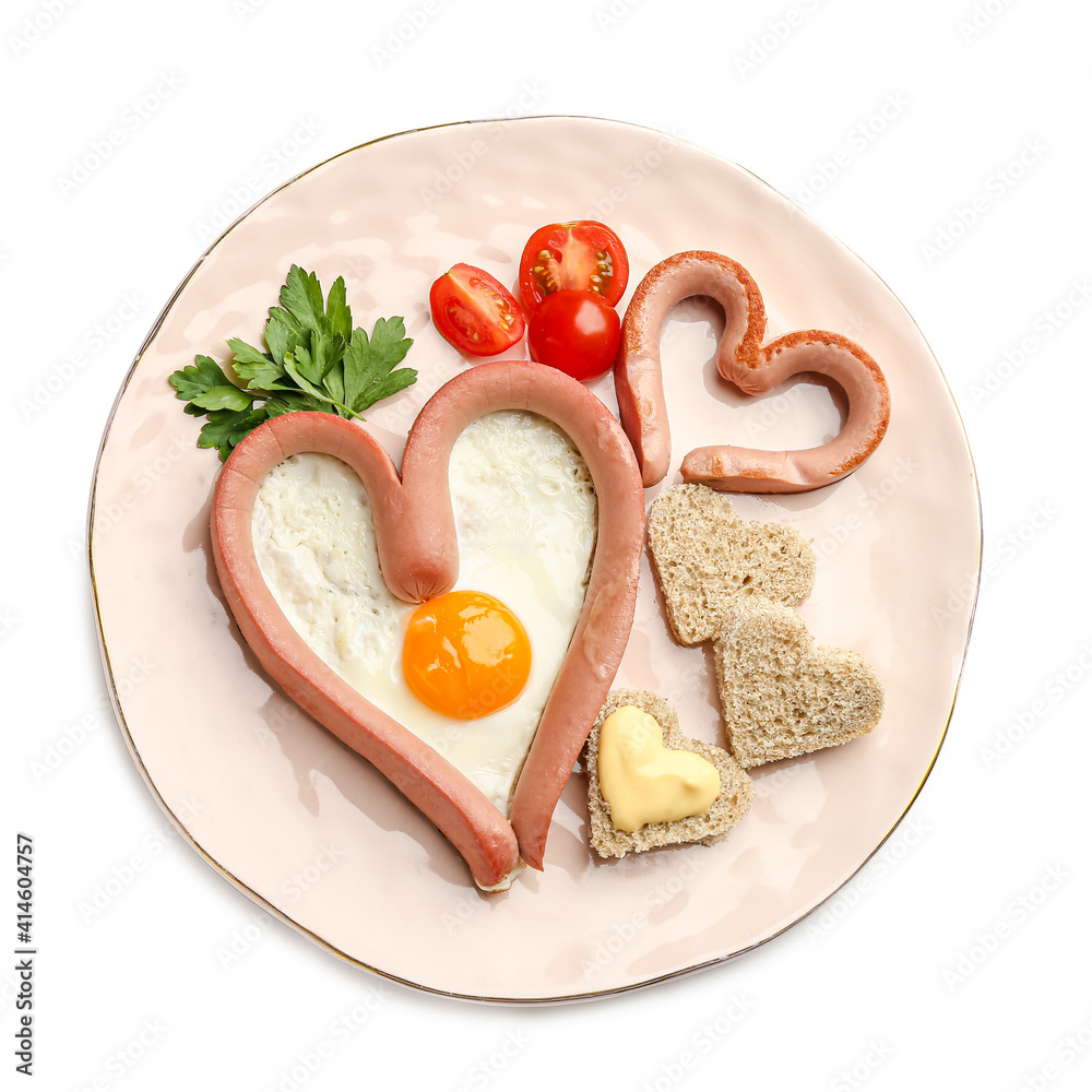 Creative breakfast for children with eggs and sausages on white background