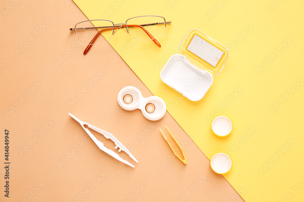 Composition with contact lenses and accessories on color background