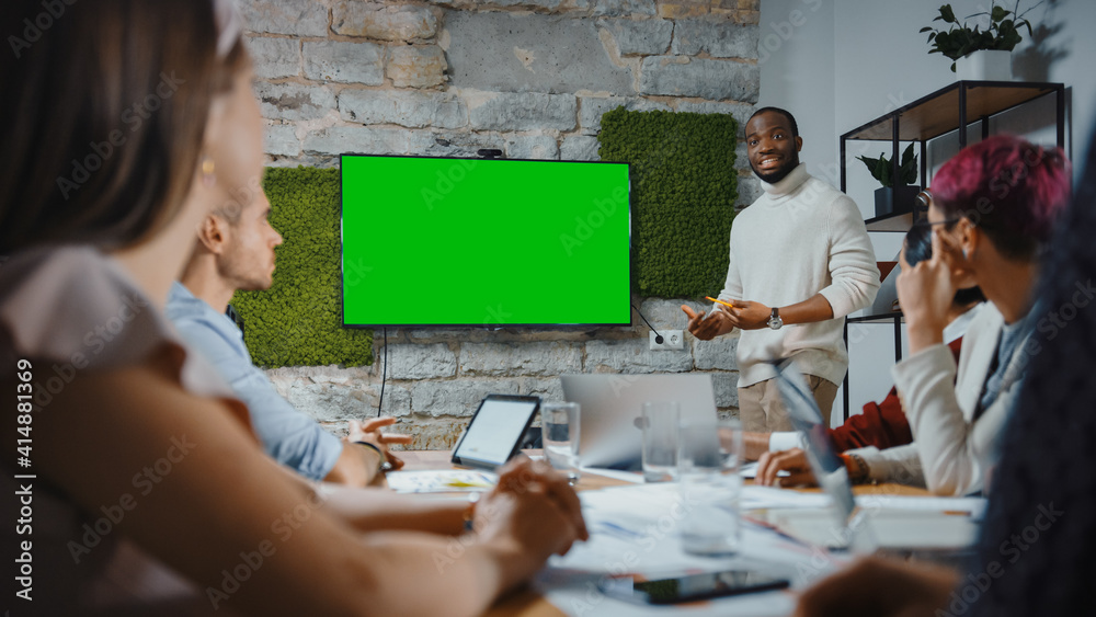 Office Conference Room Meeting: Black Chief Company Strategist Doing Green Screen TV Presentation to