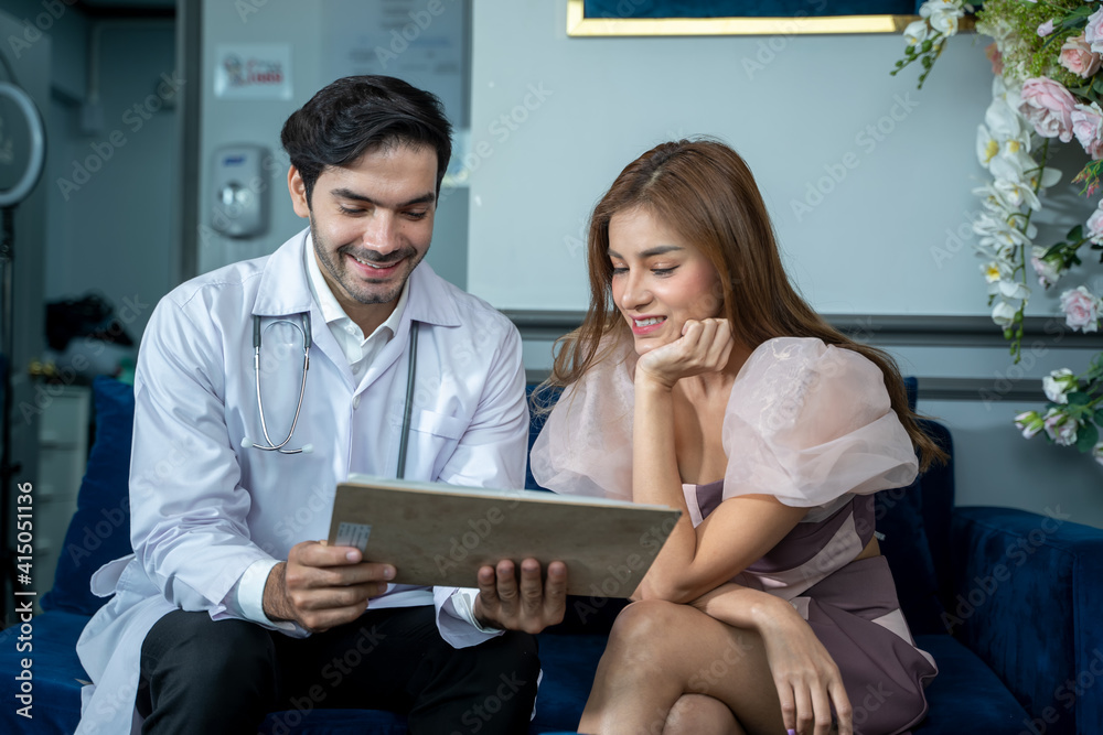 Plastic surgeon consults woman about facelift Surgery.