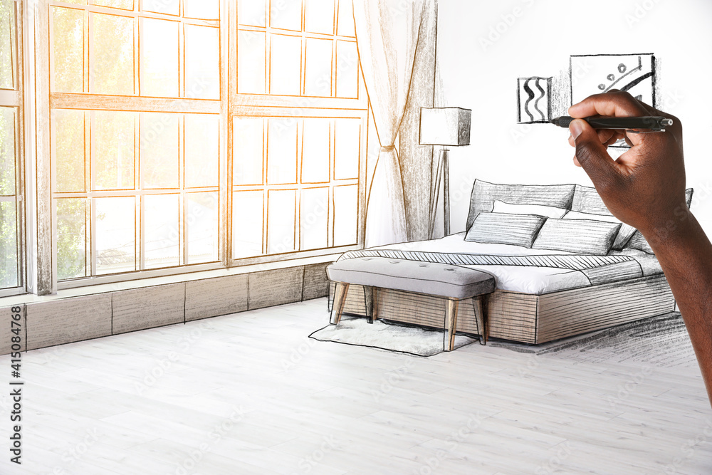 Designer drawing new interior of bedroom