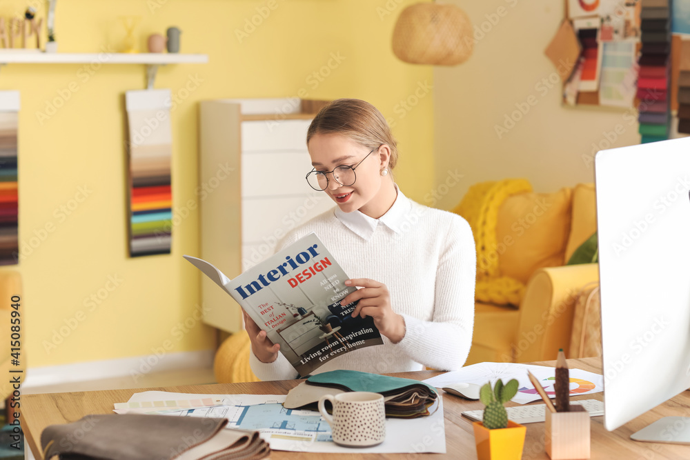 Female interior designer working in her office