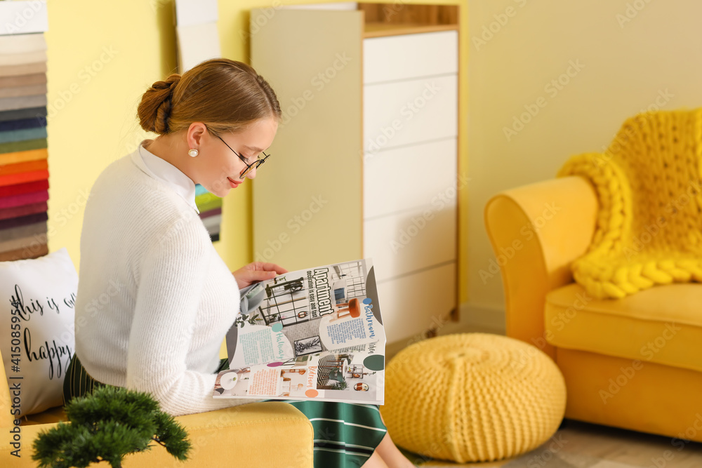 Female interior designer working in her office