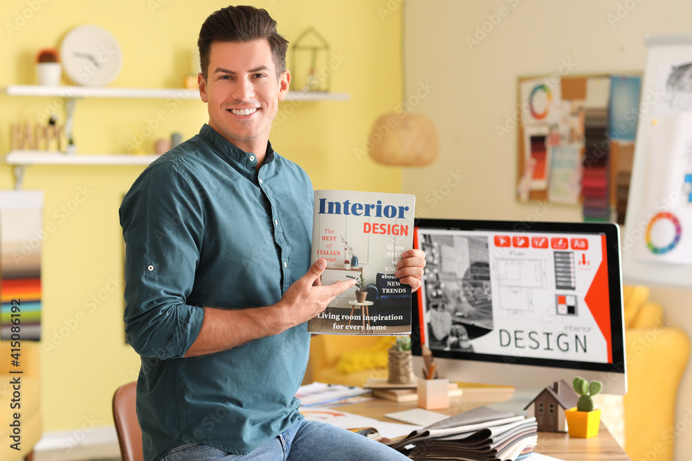 Male interior designer working in his office