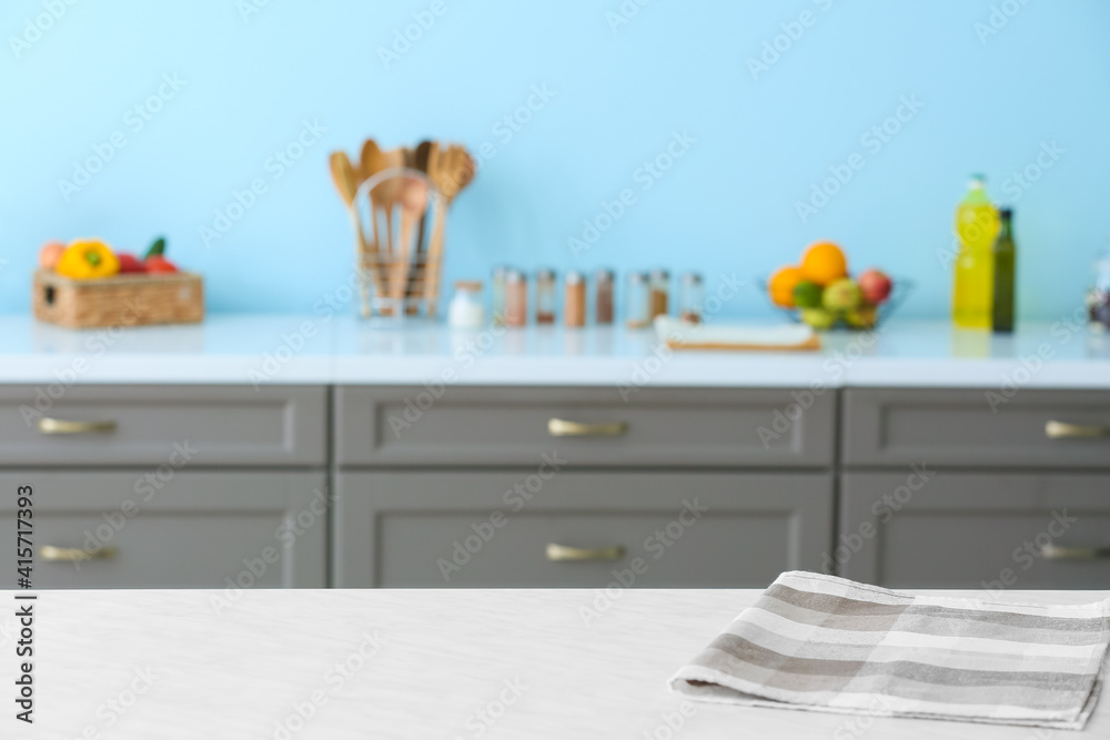 Clean napkin on table in modern kitchen