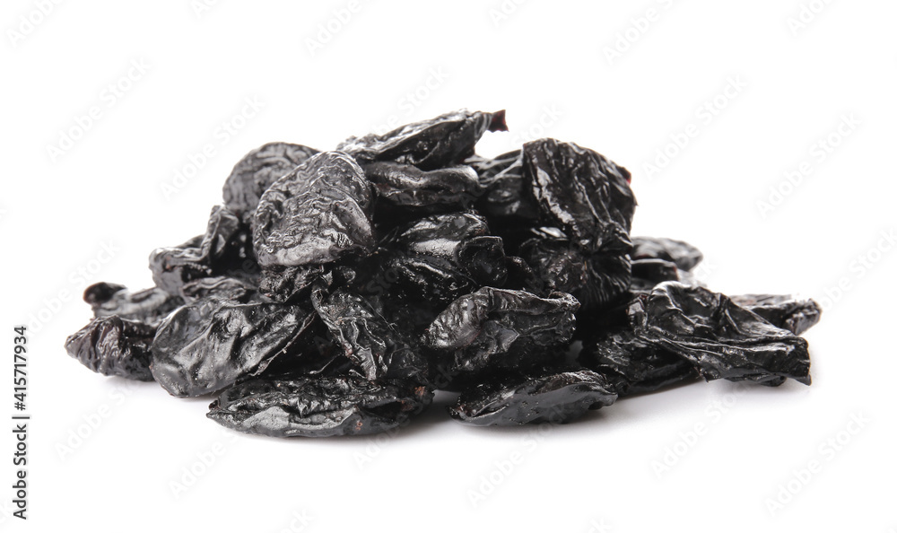 Sweet dried prunes on white background