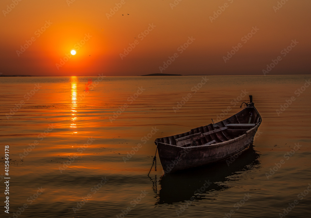 boat at sunset