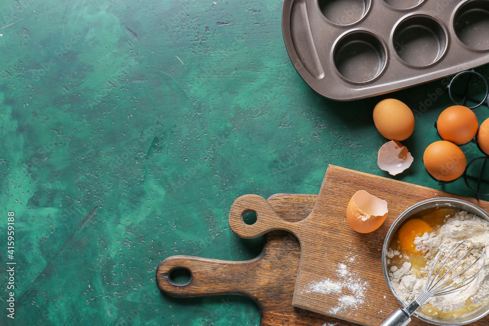 Set of kitchen utensils and ingredients for preparing bakery on color background