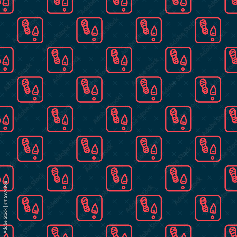 Red line Human footprints shoes icon isolated seamless pattern on black background. Shoes sole. Vect