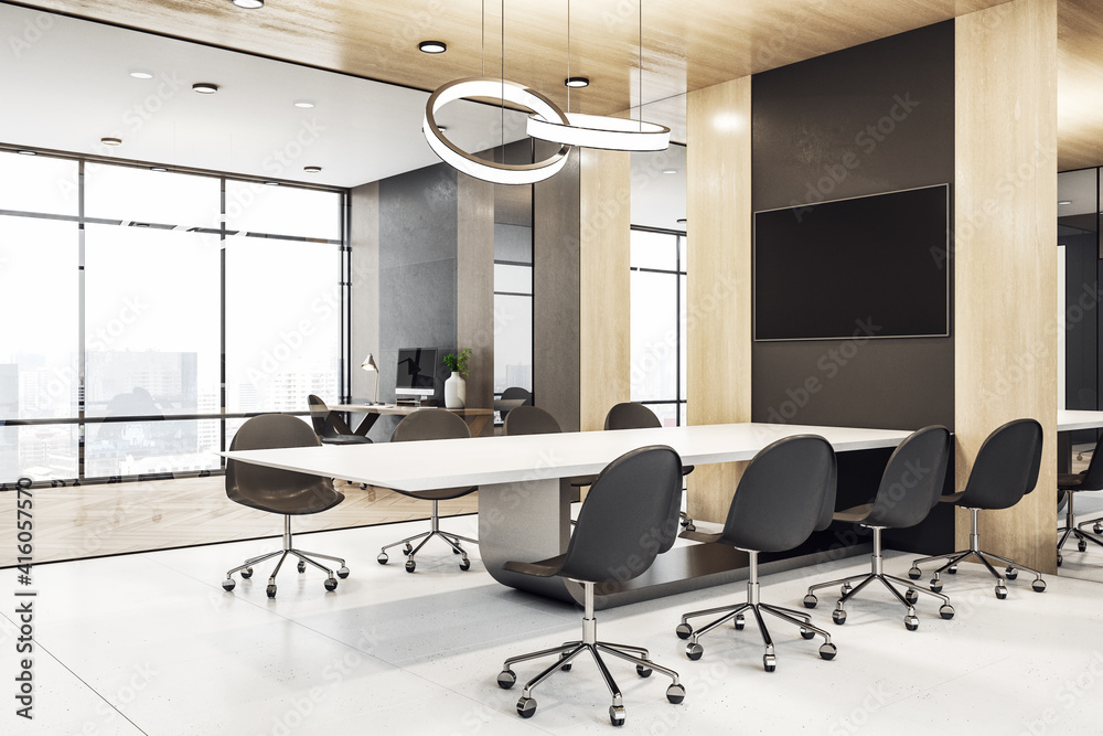 Blank black tv screen on brown wall in modern meeting room above light table, dark chairs and city v