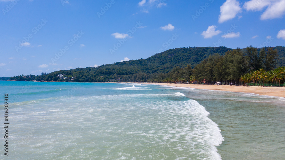 Aerial: Kamala beach is a beautiful white-sand beach which is located at Phuket, Thailand