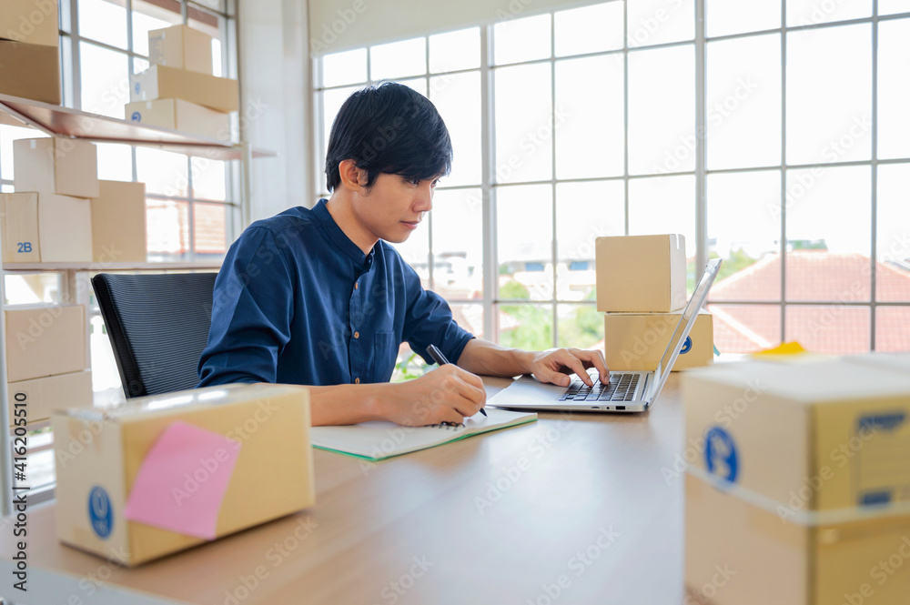 businessman using laptop checking contact customer for sell online