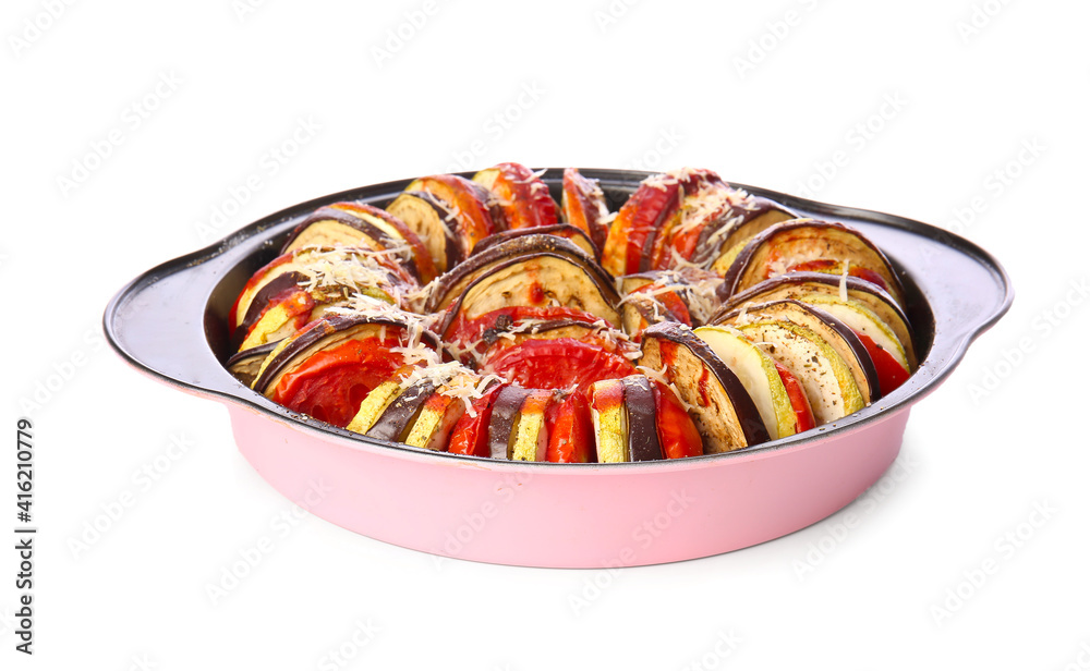 Dish of tasty baked eggplant and tomatoes on white background